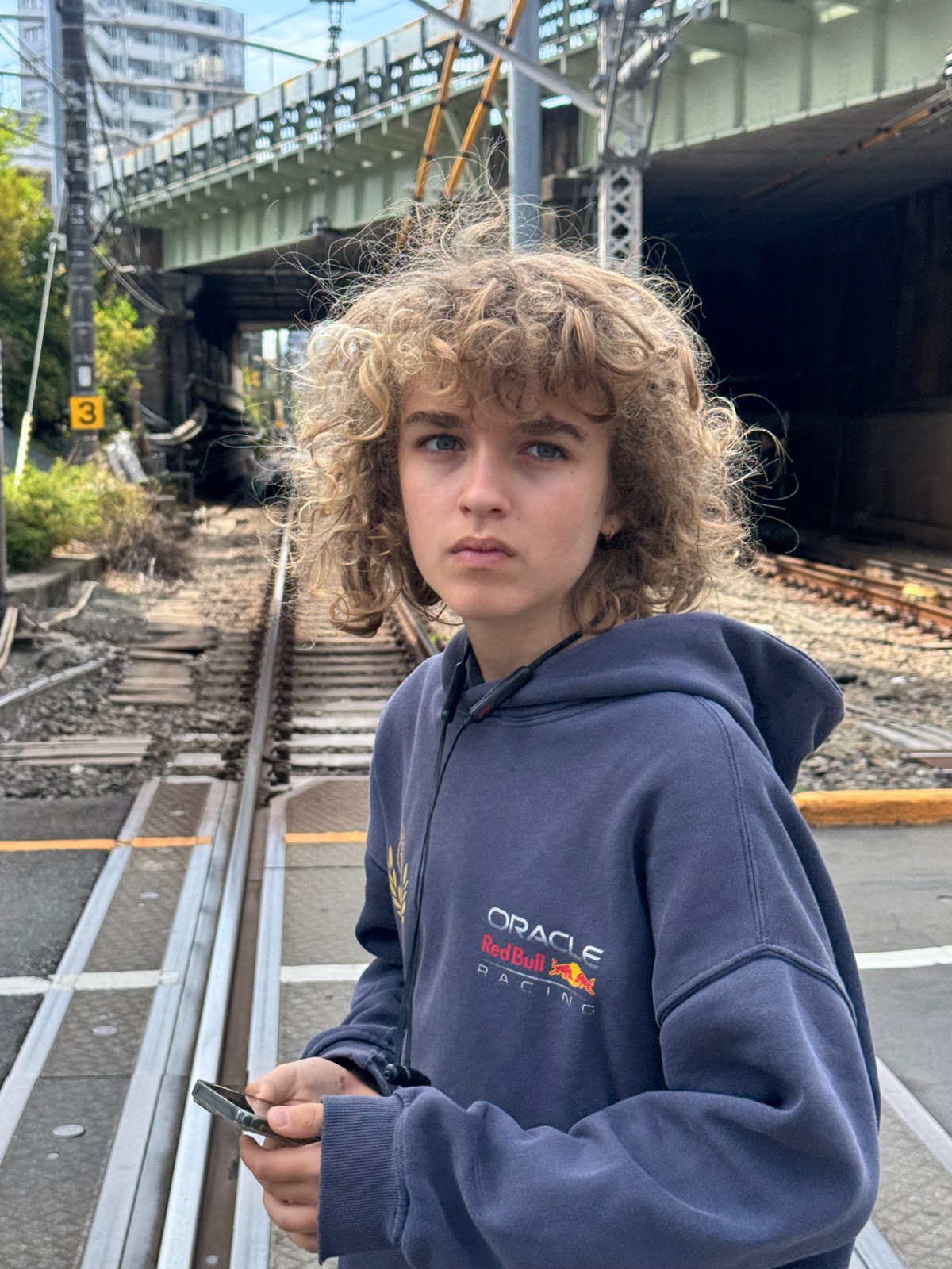 Luca portrait at the train tracks near Yoyogi