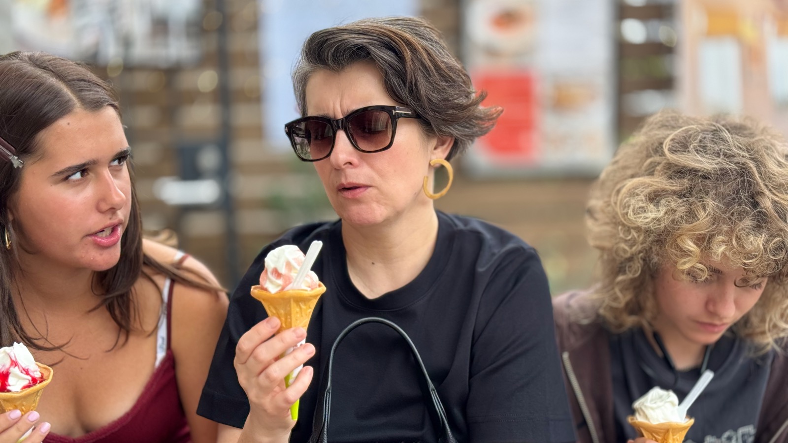 Seraphima, Natalia, and Luca enjoying soft serve cones at La Chou Chou