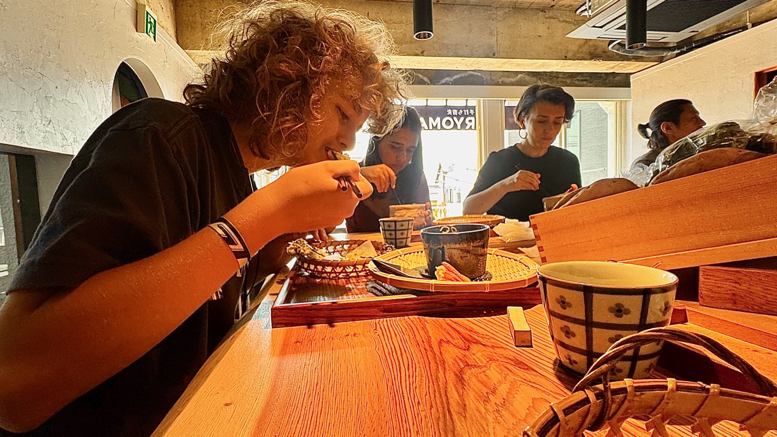 Family eating soba together at RYOMA