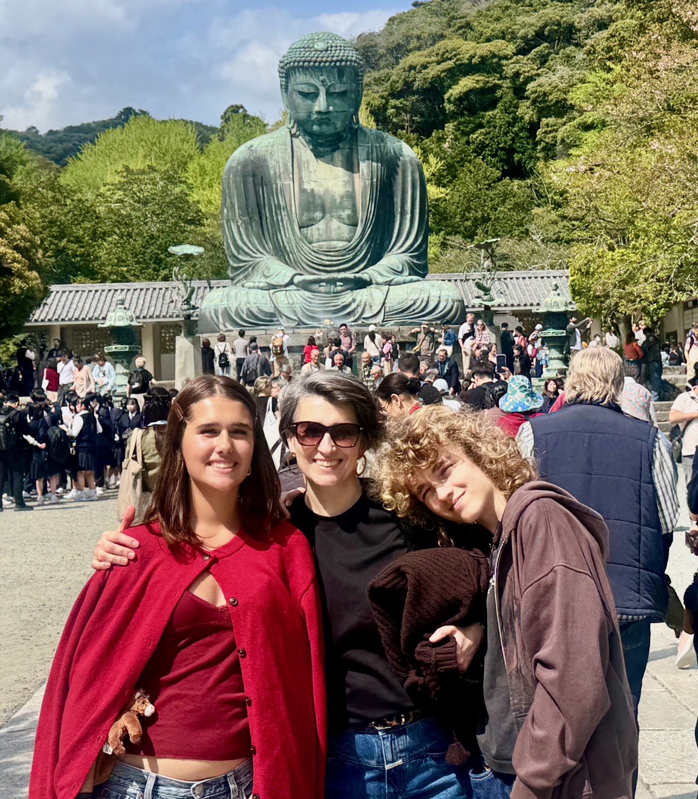 Seraphima, Natalia, and Luca in front of the Great Buddha