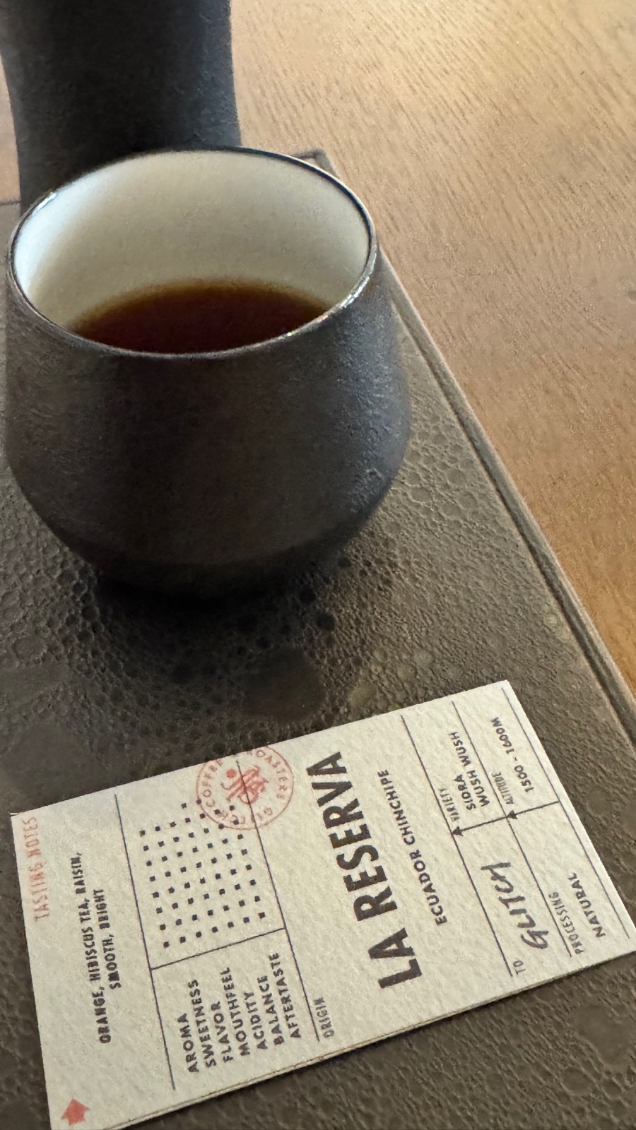 Glitch Coffee pour-over with La Reserva Ecuador tasting card
